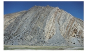 <strong>What type of deformation is shown in this photograph? </strong> A)displacement B)rotation C)internal strain of the rock D)columnar joints