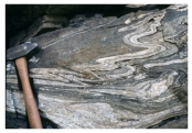 <strong>Under what conditions was this rock likely deformed? </strong> A)relatively shallow B)brittle conditions C)conditions that favored fracturing D)hot and deep conditions