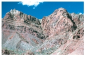 What type of feature is present in the notch in the center of the photograph?