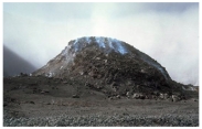 <strong>What is a main hazard of this type of volcano? </strong> A)hot molten fragments thrown a short distance from the volcano B)viscous lava that moves too fast for people to outrun C)destruction by moderately fluid lava flows that can flow far from the volcano D)relatively small pyroclastic eruptions caused by localized explosions or collapse