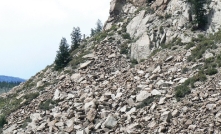 <strong>Which of the following surface environments is the most likely site for deposits in this photograph?  </strong> A) steep mountain front B) river channel C) sand dunes D) beach E) lake <div style=padding-top: 35px> 