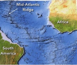 <strong>The image shows the Mid-Atlantic Ridge, a submarine volcanic mountain belt that is a key location in the process of: </strong> A) seafloor spreading B) land bridges C) continental drift D) South Atlantic drift