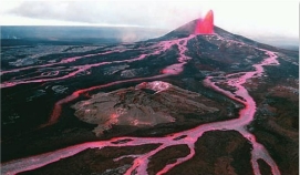 <strong>Shield volcanoes are built up primarily by relatively: </strong> A) nonexplosive outpourings of lava B) explosive ash-forming eruptions C) high-viscosity dome-forming eruptions