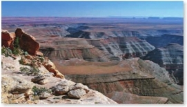 <strong>Which principle can be used by a geologist to determine that the rocks shown in the photograph have not been deformed since they were deposited? </strong> A) Original horizontality B) Superposition C) Cross-cutting relations