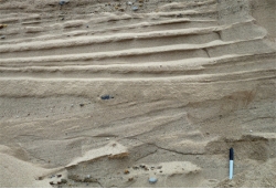 <strong>The main reason that the deposits shown here are sorted and stratified is that:  </strong> A) the glacier that dropped them was moving very slowly. B) the glacier that dropped them was moving quickly. C) they were deposited by running water that accompanied the glacier. <div style=padding-top: 35px> 