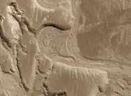 <strong>What does this curved feature, which contains a point bar, indicate about past events on Mars?  </strong> A) there were explosive volcanic eruptions B) strong winds eroded into a series of volcanic layers C) the surface once had running water that eroded and deposited sediment D) glaciers once covered the entire planet <div style=padding-top: 35px> 
