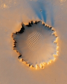 <strong>The presence of dunes in the middle Victoria Crater on Mars indicates that:  </strong> A) Mars has an atmosphere B) volcanic eruptions produced abundant sand C) glaciers once covered most of Mars D) seas once covered this area, leaving behind the dunes <div style=padding-top: 35px> 