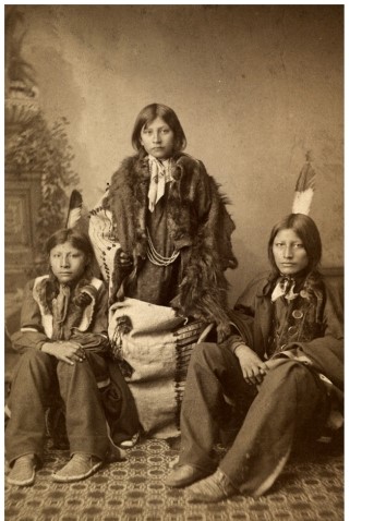 <strong>The portraits of Indian students in The Assimilation of Sioux Students at Carlisle Indian School illustrate what goal of Indian schools? </strong> A) To help Indian students maintain ties to their heritage B) To erase signs of students' Indian heritage C) To educate Indian students as well as their white counterparts D) To encourage patriotism to the United States among Indian students