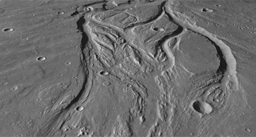 <strong>Below is an oblique view showing landforms on Mars.What process is most likely responsible for creating this landscape? </strong> A) glacial carving B) deposition C) flowing water D) burrowing