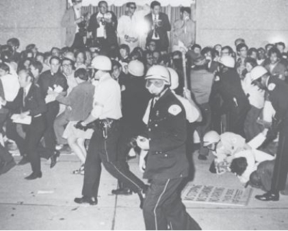 <strong>Riots at the 1968 Democratic national convention Credit: Michael Boyer/AP Images -How did these events,and the McGovern-Fraser Commission that evaluated them,lead to a more representative delegate selection process for the Democratic Party?</strong> A)by requiring delegate selection procedures to be open to all party members B)by increasing the number of delegates chosen C)by weakening the power of registered party members to choose convention delegates -Consider This: The American party system has developed more democratic ways. D)by encouraging the use of presidential caucuses rather than primaries