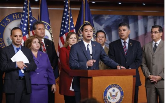 <strong>Questions 5 and 6 refer to the following image. Credit: Scott J.Applewhite/AP Images What is the pictured group of members of Congress who share some interest or characteristic and common goals?</strong> A)caucus B)colloquium C)committee -Consider This: A congressional committee's job is to process legislation. D)conference