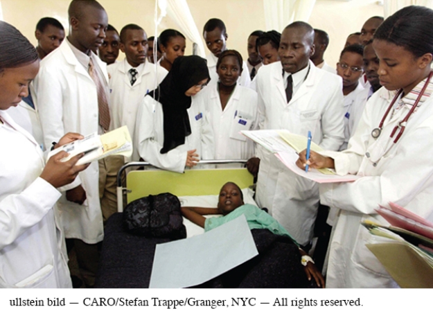 <strong>The educated middle-class professionals pictured here are representative of which of the following? </strong> A) The lack of a professional middle class in postcolonial Africa B) The enormous strain that doctors are under to combat Africa's AIDS epidemic C) The impact of postindependence governments on African society D) The serious lack of modern medical equipment in African hospitals