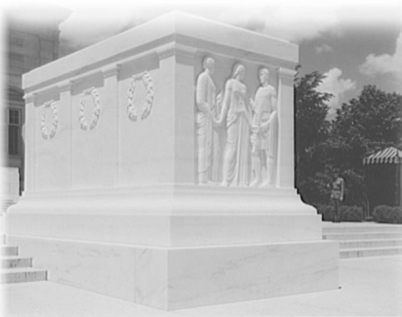 <strong> How does the design of the Tomb of the Unknown Soldier, which was dedicated in 1921 during the Washington Conference, represent the diplomatic goals of the Harding and Coolidge administrations?</strong> A) The laurel wreaths signify that the United States was a world power in the postwar period. B) The allegorical figures represent the diplomatic goals of peace, valor, and victory. C) The concept of interring an unknown soldier reaffirmed the need for global disarmament. D) The hand-joined allegorical figures represent the success of a multinational nonaggression pact.