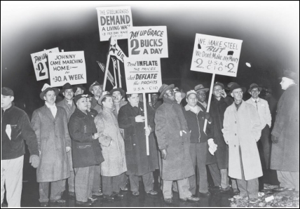 <strong> This 1946 photograph of striking steel workers demonstrates that the .</strong> A) strikers were focused on shortening the work week B) strikers did not support returning U.S. veterans C) labor movement had become more integrated D) labor movement had been infiltrated by communists