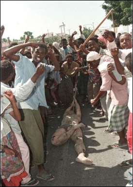 <strong> How did these contrasting images from the early 1990s of a starving Somali woman and her child and of Somali rebels dragging the corpse of an American soldier through the streets of Mogadishu, Somalia, impact the American public's perception of African nations like Somalia?</strong> A) Both images caused the United States to appeal to the United Nations to send aid and peacekeeping forces to Somalia. B) Both images convinced President Clinton to submit to the public demand of withdrawing American troops from Somalia. C) Both images encouraged Americans to view African nations as dysfunctional places where famine and fighting were endemic. D) Both images rallied popular support for aiding the poor in East Africa, prompting President George H. W. Bush to send American troops to Somalia.
