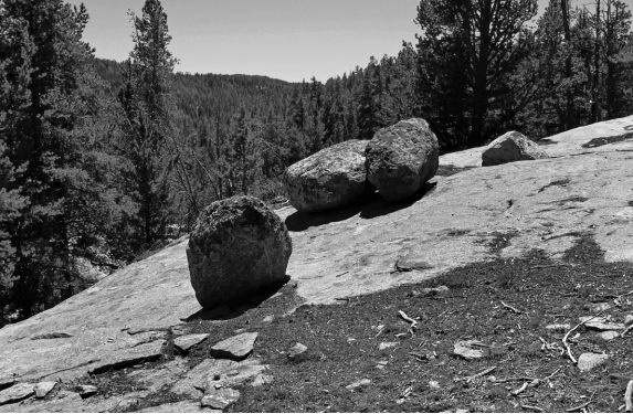Boulders left behind by glacial ice,such as these on a hillside in Wyoming,are known as __________.