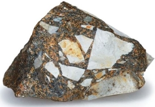 <strong> How would you describe the shape of the sediments in the rock in the above image?</strong> A)Gravel-sized B)Angular C)Rounded D)Well-sorted