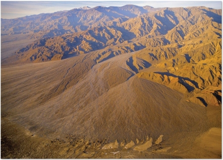 <strong> What desert landform is visible here?</strong> A)Inselberg B)Normal fault C)Playa lake D)Bajada