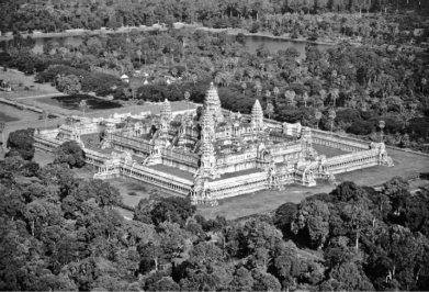 <strong>Questions refer to the images below. Image 1: Small Hindu temple in eastern India, tenth century   Image 2: Angkor Wat, built by the Khmer Empire   Based on your knowledge of world history, which of the following is an accurate description of the political role of the Khmer Empire in Asia?</strong> A) The Khmer were a vassal state of Song China. B) The Khmer were the only proponents of Vedic Brahmanism in Southeast Asia. C) The Khmer were a buffer between India and China. D) The Khmer traded with the Crusader kingdoms. <div style=padding-top: 35px> 