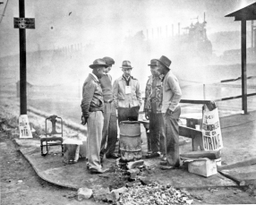 <strong>Questions refer to the images below. Image A. Striking Steel Workers Homestead PA, 1892   Image B. Striking Dockworkers' Rally in Trafalgar Square, London, 1911   How might a historian question the reliability of Image A?</strong> A) Image A appears to be posed, so it is difficult to know if it is representative of the steel strike. B) Since Image A is a photograph, it must be a reliable source. C) Image A was taken by a photographer who was hostile to labor unions. D) Image A shows that strikes were always peaceful in this time period. <div style=padding-top: 35px> 