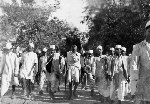 Use the image below and your knowledge of world history to answer all parts of the question that follows. Mahatma Gandhi Salt March in progress, March 12, 1930 (A) Identify ONE way that nationalist parties and leaders in Asia challenged imperial rule. (B) Explain ONE way imperial powers responded to nationalist pro-independence movements. (C) Identify and explain ONE limitation of using the image above as an example of the way that nationalist parties and leaders in Asia and Africa challenged imperial rule.
