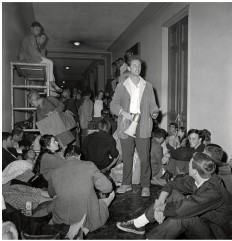<strong>The image The Berkeley Free Speech Movement shows student leader Mario Savio among other students in Sproul Hall at the University of California at Berkeley. What command of Savio's did the students seem to follow here?  </strong> A) Put your bodies upon the gears. B) Trust no one over thirty. C) If some are not free, then none of us are free. D) The personal is political. <div style=padding-top: 35px> 