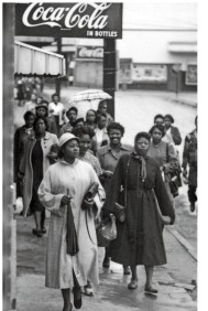 <strong>In this photo, taken during the Montgomery Bus Boycott in 1956, a group of black women are shown commuting on foot. What is significant about the demographic shown in this image?  </strong> A) Black women made up the majority of bus riders, making their choice to boycott particularly effective. B) Young women were the group most likely to boycott city buses in Montgomery. C) Black women were not as vulnerable to intimidation and threats as black men. D) Such walks were only popular among black women at the beginning of the boycott because they quickly gave up. <div style=padding-top: 35px> 