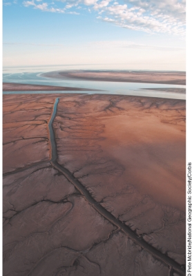 <strong>Why is this part of the Colorado River in Mexico dry? </strong> A)Severe droughts have reduced water flow so that the river often dries up. B)So much water has been diverted for irrigation that the river often dries up. C)The Colorado is an intermittent river, which means it naturally dries up in the late summer. D)Dams built for hydroelectric power generation have cut off water to this region of the Colorado River.