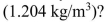 What is the number density of tritons in a 50% d/50% t plasma that has the same mass density as air at STP