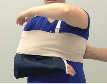 <strong>The technique demonstrated in this diagram would be the most appropriate for which of the following injuries? </strong> A) Injury to the middle deltoid B) Rotator cuff injury C) Shoulder dislocation D) Sprain of the acromioclavicular joint E) Injury to the coracobrachialis