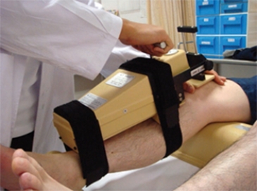 <strong>What does this apparatus measure? </strong> A) Quad strength B) Displacement of the knee C) Joint effusion D) Proprioception ability of the knee E) Nerve conduction