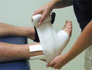 <strong>What is the pain purpose of the pad in this picture? </strong> A) Provide support to the lateral ankle B) Create a focal compression C) Provide stability for a bone fracture D) Prevent syndesmotic ankle sprains E) Provide support to the medial ankle