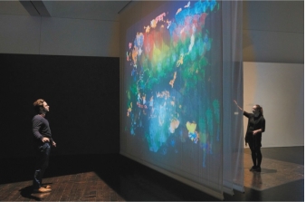 <strong> Even though Camille Utterback's Entangled (figure 6.28A) is not a traditional painting, why might we consider it one?</strong> A) Its message and use of paint B) Its message and sense of human touch C) Its incorporation of textile scrims D) Its interaction with the audience