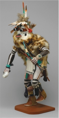 What is the purpose of Henry Shelton's wildcat kachina figure (figure 17.24) (religion and spirituality, politics and the social order, recording and communicating information, decoration, expression, or social action)? Why do you think the work has this purpose?