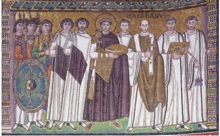 <strong> In the San Vitale mosaic (figure 14.11), symbols signal that Emperor Justinian is the leader of the EARTHLY realm because he is:</strong> A) Holding a dish for the Eucharist B) Standing with twelve men C) Standing solidly on the floor D) Wearing a purple robe like a Roman Emperor