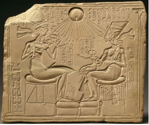 Explain the aspects of traditional, consistent conventions of Egyptian art that were disregarded or contradicted in Akhenaten, Nefertiti, and their three daughters (figure 13.22). Give specific examples.