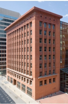 What kind of structural system was used in Louis Sullivan and Dankmar Adler's Wainwright Building (figure 12.6)-load-bearing, corbel, post-and-lintel, cantilever, arch, dome, reinforced concrete, frame, or suspension? How do you know? Did this system make the most sense to use?