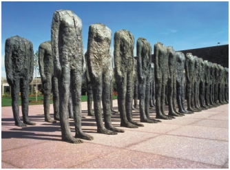 Magdalena Abakanowicz's Bronze Crowd (figure 10.6A) with Donatello's Mary Magdalene (figure 10.24). How do the artists convey different or similar messages using the durability and appearance of the materials, as well as the visual elements of art?