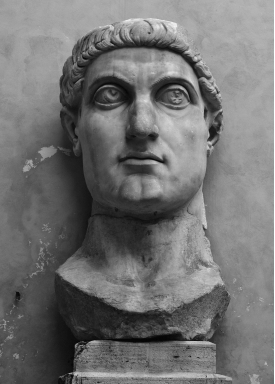 <strong> What do the facial features of Constantine suggest about this statue?</strong> A) Constantine was unhappy with how he was portrayed in public art B) According to legend, Constantine's eyes were oversized C) The sculptor was not skilled enough to produce balanced features D) It was large and imposing, meant to be viewed from a subordinated position