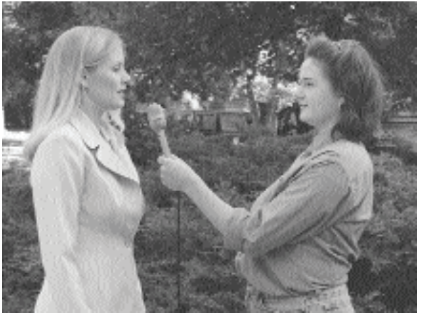 <strong>What, if anything, is wrong with this shot? (circle any answers that apply) </strong> A) Draws attention away from intended focus of the shot, the interviewee B) It's aesthetically less pleasing than an OTS C) Both eyes of interviewee are not visible D) Wasted space in the center of the picture E) There's nothing wrong with this shot at all