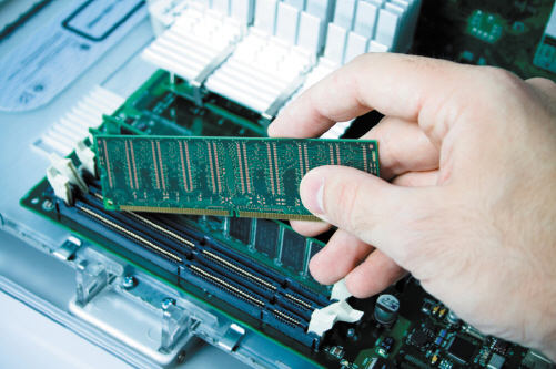 <strong> The accompanying figure shows an example of ____.</strong> A) ROM chips B) a laser toner cartridge C) RAM chips D) disk sectors