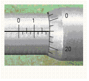 Read the measurement shown on the U.S. micrometer.  