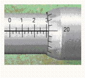 Read the measurement shown on the U.S. micrometer.  