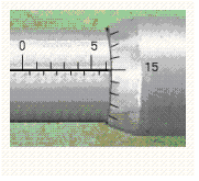 Read the measurement shown on the metric micrometer.  