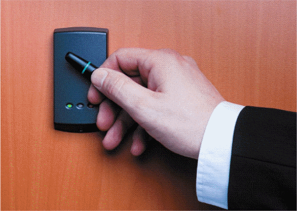 <strong> Which of the following is a technology, as shown in the accompanying figure, that uses radio signals to communicate with a tag placed in or attached to an object, an animal, or a person?</strong> A) OCR B) RFID C) OMR D) TMR