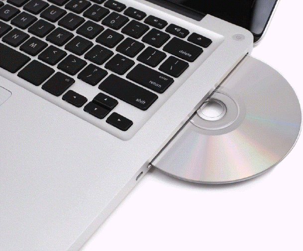 <strong> Which of the following is a good practice to follow to avoid scratching or damaging a disc like the one in the accompanying figure?</strong> A) Hold the disc by its edges. B) Stack the discs whenever possible. C) Touch the underside of a disc. D) Do not worry about exposing discs to any type of contaminant.