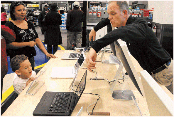 Computer manufacturers, software vendors, and retailers usually pay workers like the one shown in the accompanying figure, based on which of the following?