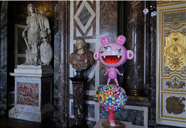 <strong> Which statement about Takashi Murakami's Kiki is correct?</strong> A)It was designed to blend in with the exhibition setting, the Palace at Versailles. B)It shows the way contemporary Japanese art remains closely bound to traditional techniques such as woodblock prints. C)It was made of pink plastic. D)It was made of brightly painted clay.