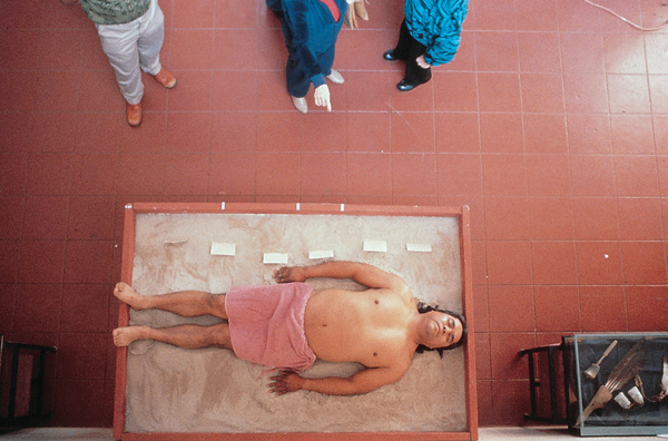 <strong> In The Artifact Piece , which mode of representing his race in contemporary American culture and museums does Native American artist James Luna critique?</strong> A)As primitive B)As ignorant C)As extinct and vanished D)As overly focused on artifacts such as grave goods