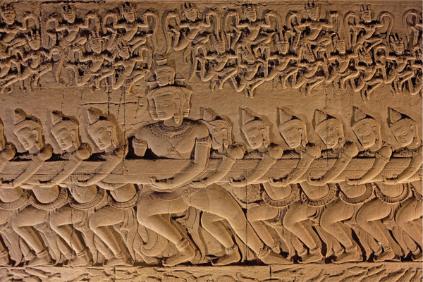 <strong> How is rhythm deployed in Churning the Ocean of Milk from Angkor Wat?</strong> A)The heads are rendered with syncopated rhythm. B)The demons are depicted with alternating rhythm. C)The spirits in the top section are represented using eccentric rhythm. D)The series of legs is depicted using regular rhythm.